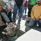 People in Burke, South Dakota pull out a soggy bag that was supposed to be a time capsule (Photo by Matt Gade/The Daily Republic)